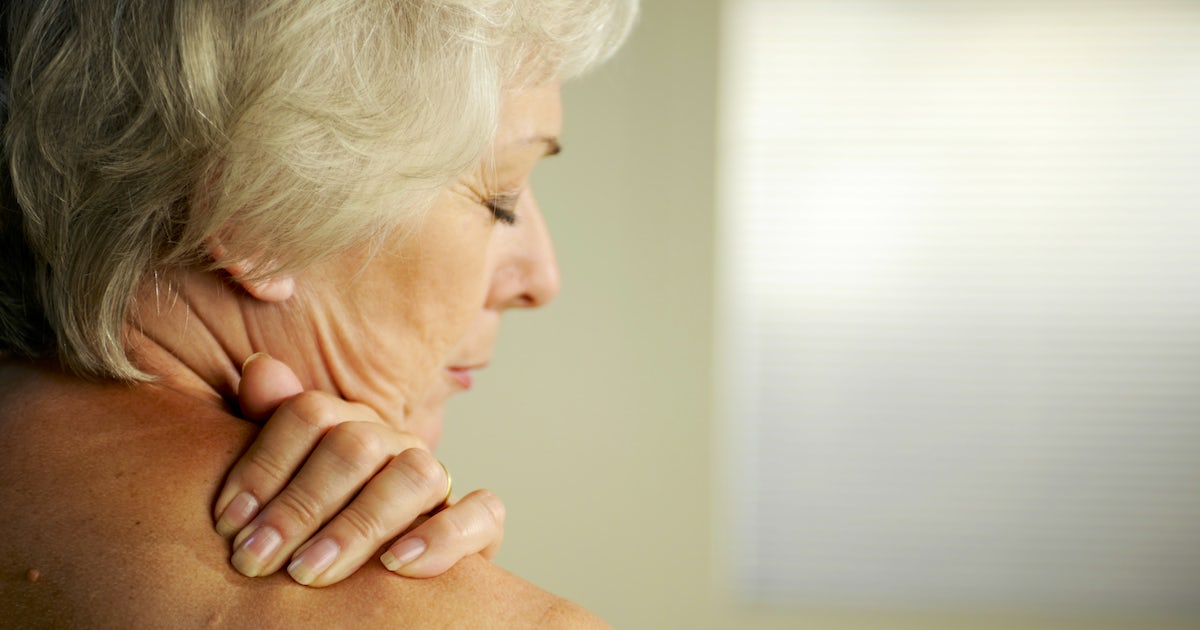 senior with neck pain